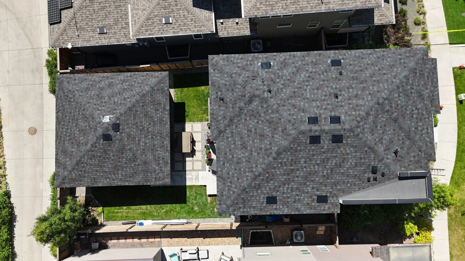 Aerial view of storm-damaged Colorado roof being documented