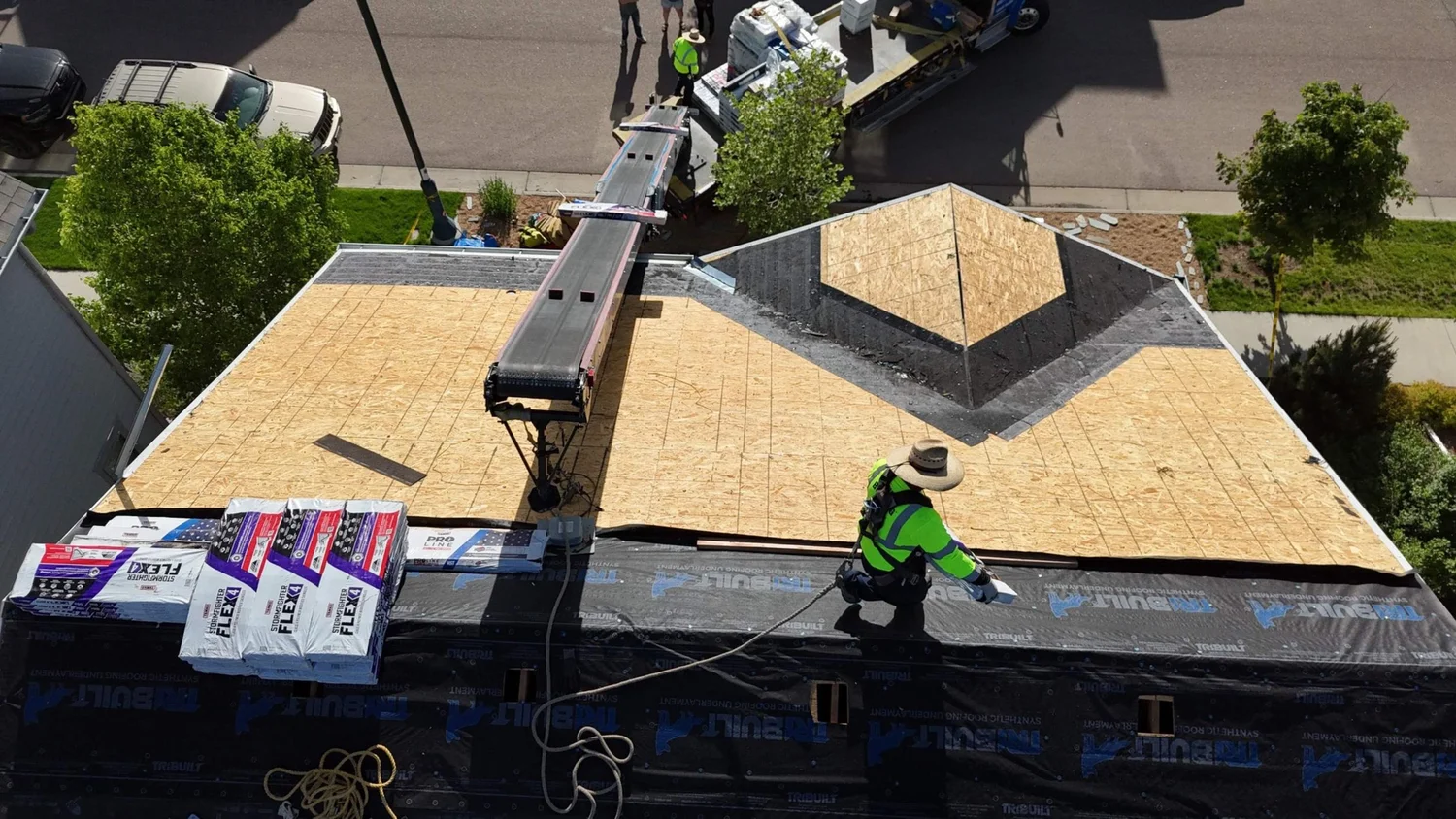 Alta Roofing crew repairing a roof
