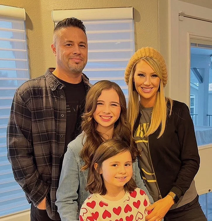 Josh Wilkey, President & Director of Operations at Alta Roofing, with his family